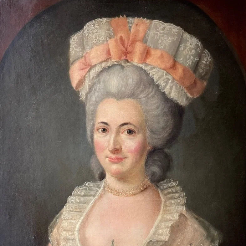 18th century French portrait of a lady in a lace cap with salmon ribbons, oil painting in a carved gilt frame