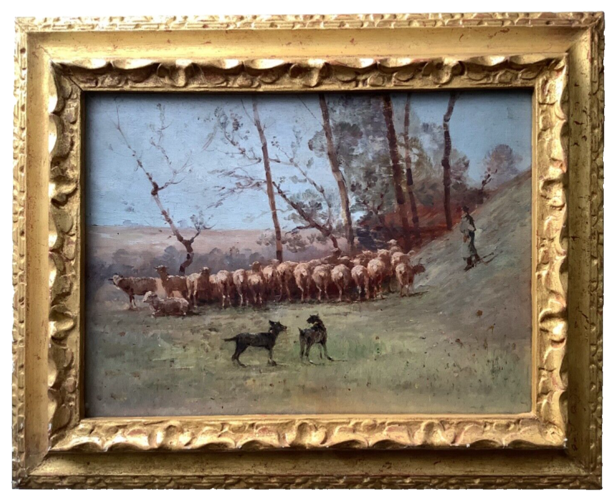Unsigned French oil on panel of a shepherd driving his flock through bare trees, in a carved giltwood frame