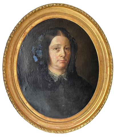 19th century French oil portrait of a woman with blue flowers in her hair, gilt oval frame