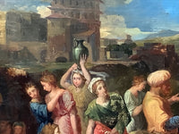 Detail of the Roman city behind the well, a tall palazzo and arcaded walls above the heads of the women, with a green bronze vessel raised against the sky