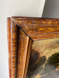 Open mitre joint and hand painted honey scrollwork on the seventeenth century French frame corner