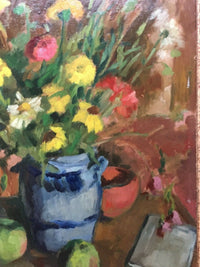 Right side of the composition with the terracotta bowl beside the jug, an open grey book on the table and a sprig of pink blossom laid across it