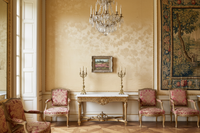 Signed Barbizon heather landscape by James Desvarreux in a carved frame above a console in an elegant French salon