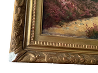 Macro of the lower left corner showing the loss to the carved ornament with the gesso exposed, and the beaded and gadrooned courses of the frame beside it
