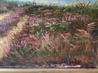 Macro of the heather worked in dry vertical strokes of rose and wine over the bare canvas weave, with the signature reading through the vegetation at the lower edge