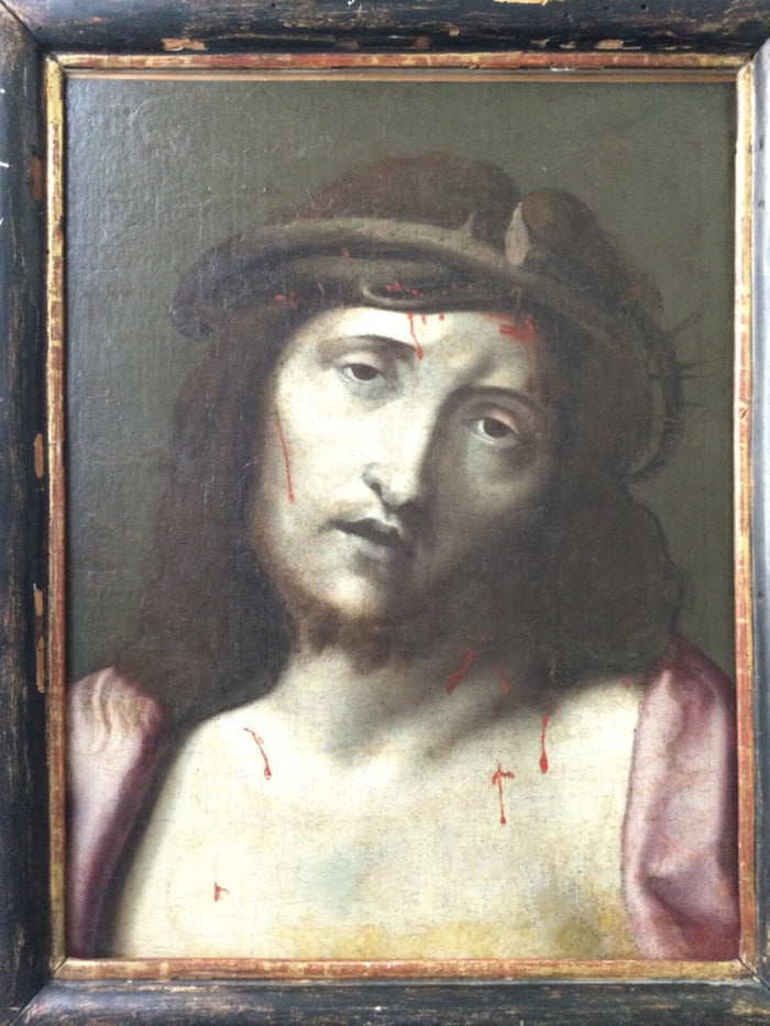 Ecce Homo after Correggio, Christ crowned with thorns in half length against an olive ground, oil on canvas in an antique ebonised frame