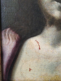 Macro of the left shoulder in the Ecce Homo showing the rose drapery in thin glazes, two drops of blood over the flesh and the age craquelure of the original paint