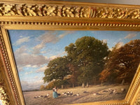 The upper rail of the frame seen at an angle, the berry and foliage frieze standing in deep relief above the beaded course