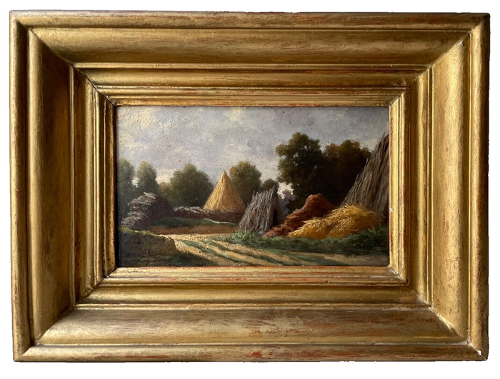 Antique French Barbizon landscape with haystacks signed and dated 1882, oil on wood panel in a gilded carved frame