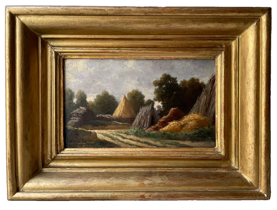 Antique French Barbizon landscape with haystacks signed and dated 1882, oil on wood panel in a gilded carved frame