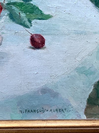 Macro of the signature M. FRANÇOIS-AUBERT in capitals at the lower right, beside a single cherry on the tablecloth
