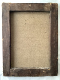 Reverse of the painting showing a plain relining canvas of regular weave stretched over a hand cut wooden stretcher with lapped corner joints, the wood darkened with age and bearing old nail holes along the lower member, with no stamps or labels present