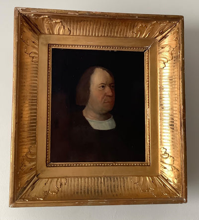 Seventeenth century German School portrait of a man in a plain white linen collar against a black ground, oil on panel in a deep gilt frame