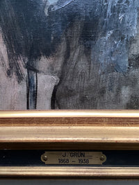 Lower edge of the Grün portrait showing the brass nameplate on the gilt frame, the reeded moulding rubbed to red bole, and the canvas weave reading through the thin dark paint