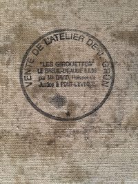 Circular studio sale stamp on the reverse of the Grün canvas, from the sale of the artist's studio at Les Girouettes, Le Breuil-en-Auge, conducted by a bailiff at Pont-l'Évêque