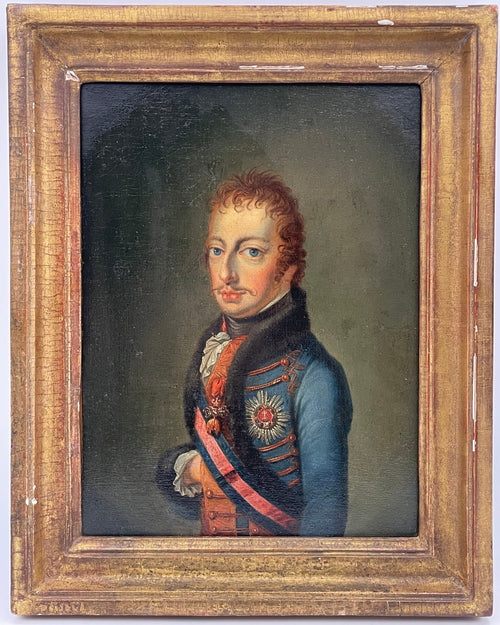 Portrait of a hussar officer in pale blue dolman with black fur pelisse and a silver breast star, early 19th century Austrian oil on canvas in a period gilt frame