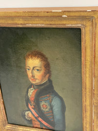 Raking view of the upper right corner showing the burnishing streaks in the water gilding, two gesso losses at the top edge and the canvas weave reading through the ground