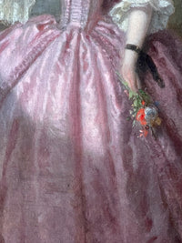 Detail of the pink silk gown with its ruched bodice and lace cuff, the hand holding a small cut bouquet with a black mitten falling from the wrist