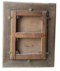 Reverse of the unlined canvas on its keyed stretcher, showing a stencilled colourman mark in two lines across the lower half