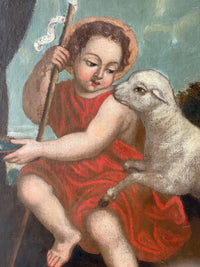 Macro of the child and the lamb, the red drapery worked in bright vermilion arabesques over a darker ground