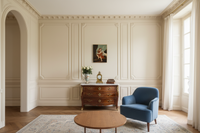 The Saint John the Baptist canvas hung above a Louis XV commode in a panelled Paris room