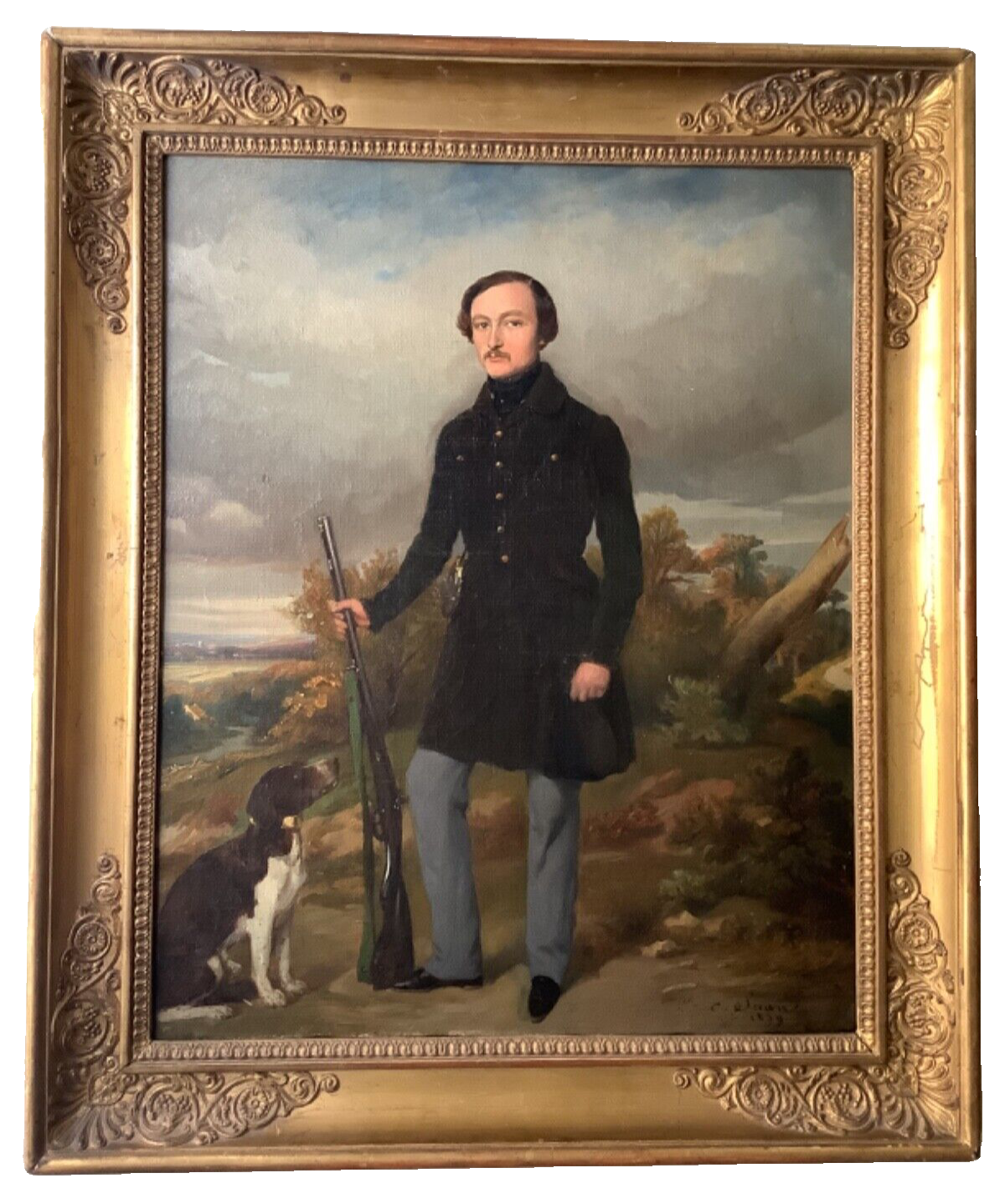 Signed 1839 French portrait of a young hunter standing with his gun and his pointing dog, oil on canvas in a period gilt frame