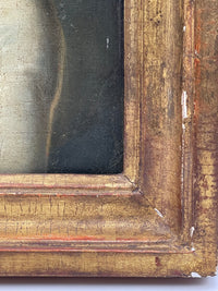 Deep cove of the gilt frame, its gilding rubbed through to the red bole
