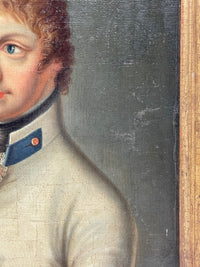 Face and collar close to the inner edge of the frame, the craquelure crossing the white coat